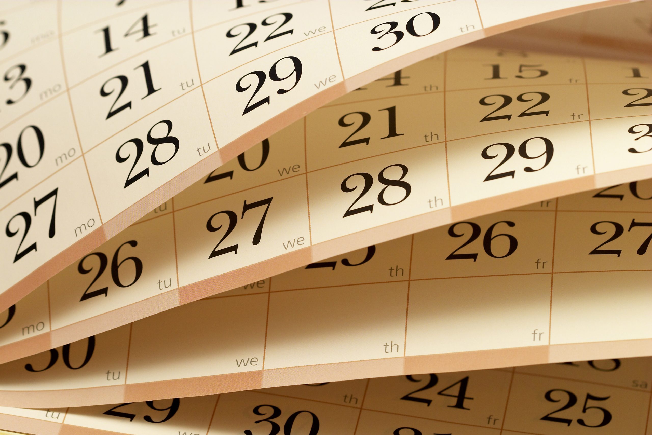 Calendar fragment with half-opened sheets in different angles